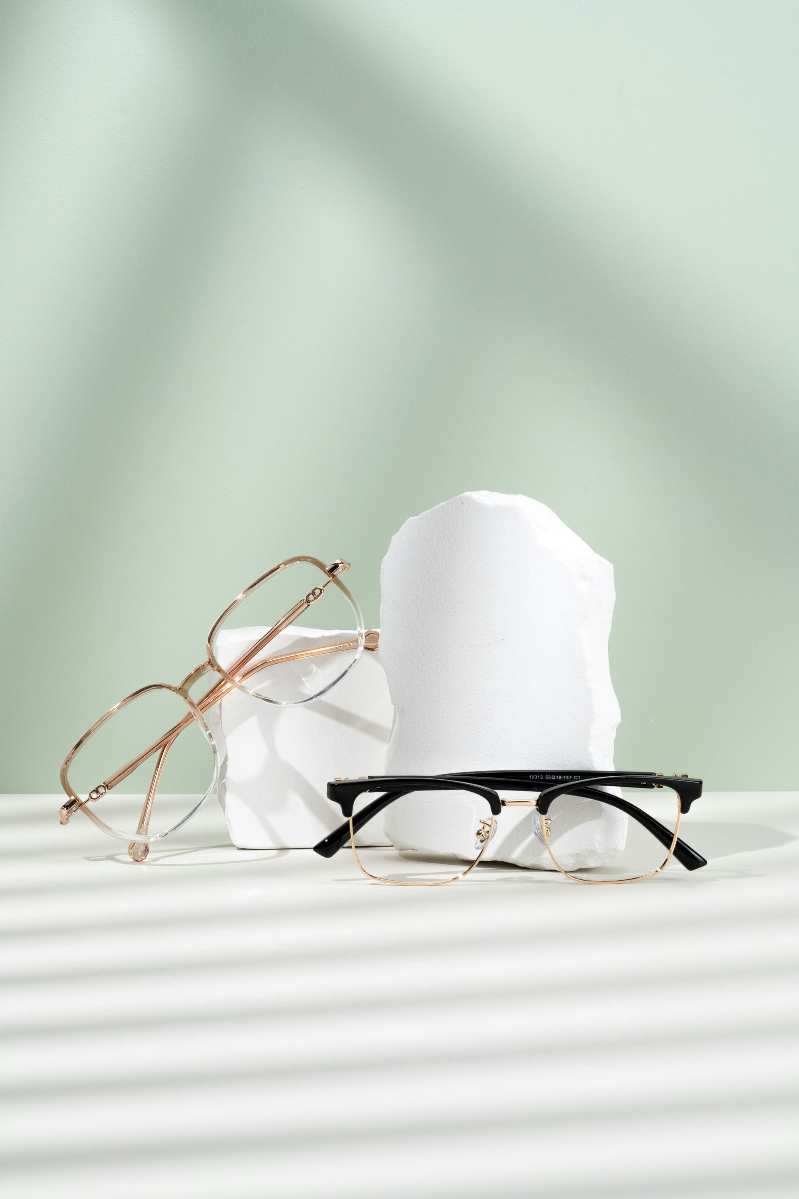 A pair of glasses sitting on top of a table